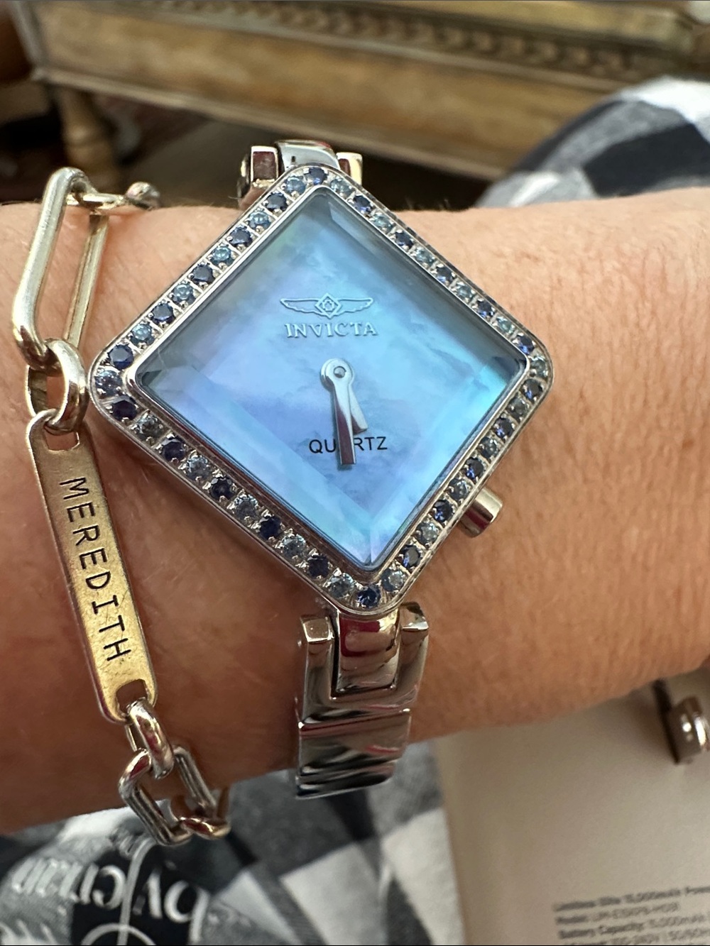 Invicta Women's Silver Bracelet Watch with Blue Dial and Crystal Bezel